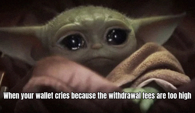 A FUNNY MEME ABOUT HIGH WITHDRAWAL FEES, SHOWING A WALLET WITH A SAD FACE AND TEARS, WITH A CAPTION SAYING 